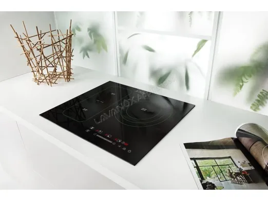 How does a 4 burner induction cooktop work?