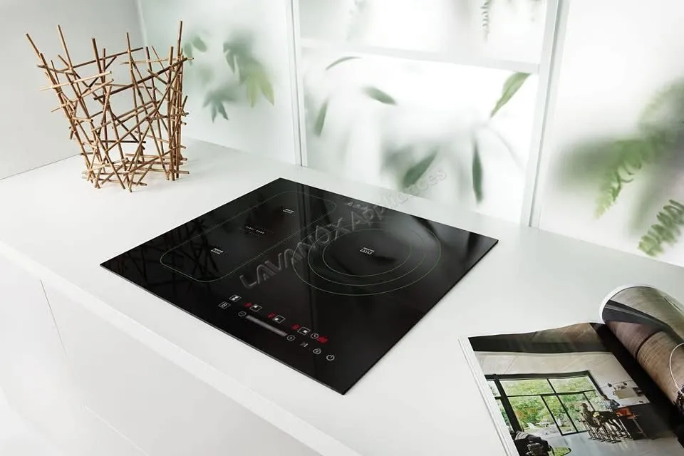 How does a 4 burner induction cooktop work?